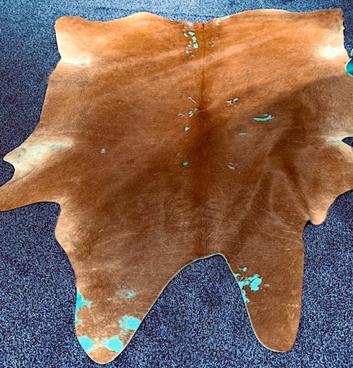 Turquoise Freckles Acid Wash on Brown Cowhide Rug